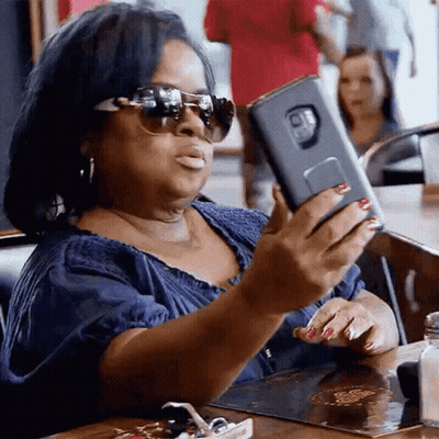 Woman In Sunglasses Taking Selfie GIF
