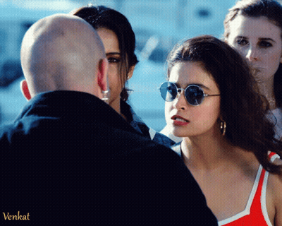 Woman In Sunglasses Talking To Bald Man Venkat GIF