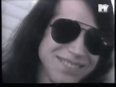 Woman In Sunglasses With MTV Logo GIF