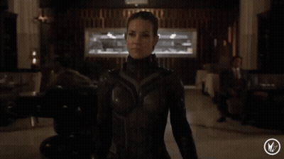 Woman In Superhero Costume GIF