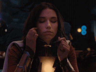 Woman In Superhero Costume And Sunglasses GIF