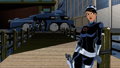 Woman in Superhero Costume on Dock With Tank