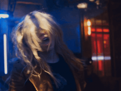 Woman In Superman Costume Smiling GIF