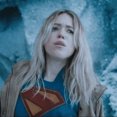 Woman In Superman T-Shirt Looking Up GIF