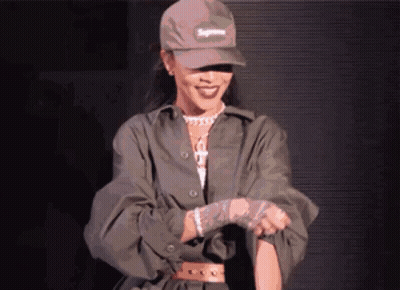 Woman In Supreme Hat And Green Jacket GIF