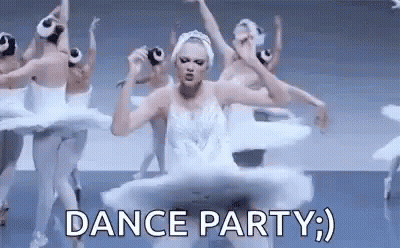 Woman In Swan Dress Dancing With Ballerinas GIF