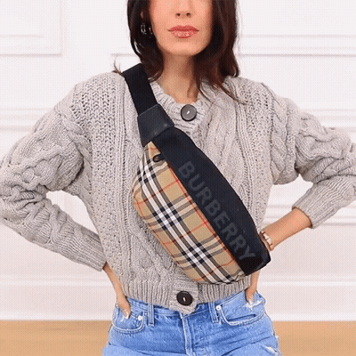 Woman In Sweater And Burberry Bag GIF