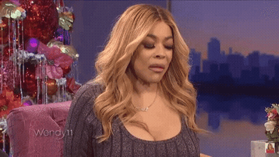 Woman In Sweater And Necklace Saying Wendy GIF