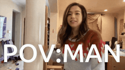 Woman In Sweater In Front Of POV Man Sign GIF