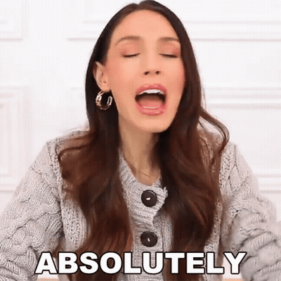 Woman In Sweater Saying Absolutely GIF
