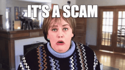Woman In Sweater Saying It's A Scam GIF