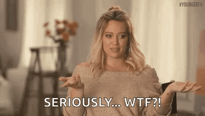 Woman In Sweater Saying Seriously Wtf GIF