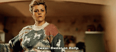 Woman In Sweater Saying Swear On Dolly GIF