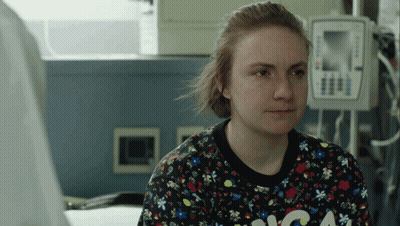 Woman In Sweater With Letter A At Medical Device GIF