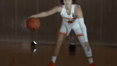 Woman In Syracuse Jersey Holding Basketball GIF