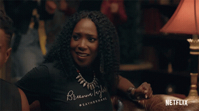 Woman in T-Shirt Saying Breanna Taylor