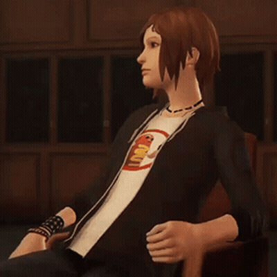 Woman In T-Shirt Saying Iu Sitting In Chair GIF