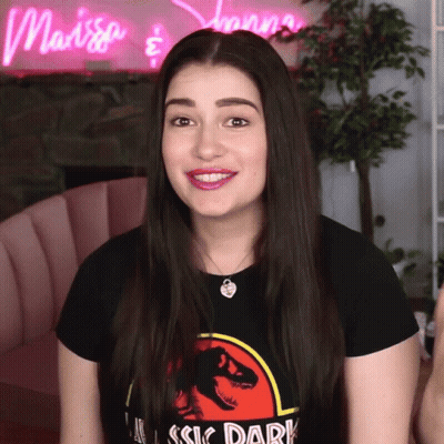 Woman In T-Shirt Saying Rassic Dark GIF