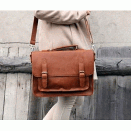 Woman In Tan Coat With Brown Leather Messenger Bag GIF