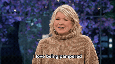 Woman In Tan Sweater Saying I Love Being Pampered GIF