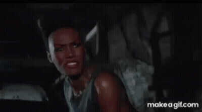 Woman In Tank Top Making Funny Face GIF