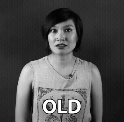 Woman In Tank Top Saying Old GIF