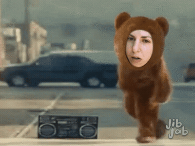 Woman In Teddy Bear Costume Walking GIF