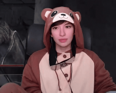 Woman In Teddy Bear Hooded Jacket And Hat GIF