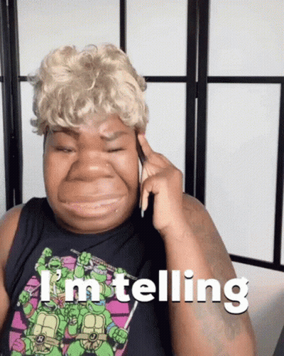 Woman In Teenage Mutant Ninja Turtles Shirt Talking On Phone GIF