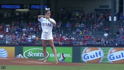 Woman In Texas Shirt Throws Baseball GIF