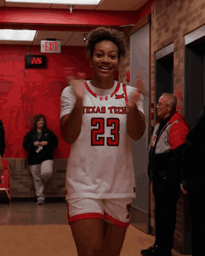 Woman In Texas Tech Jersey Clapping GIF