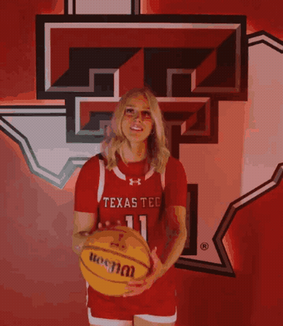 Woman In Texas Tech Jersey With Logo GIF