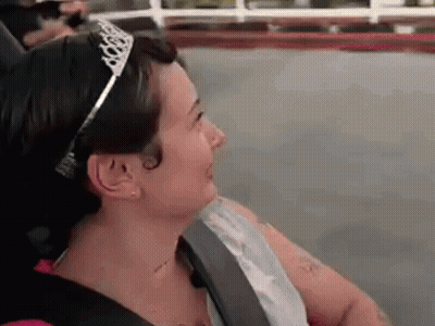 Woman In Tiara On Roller Coaster GIF