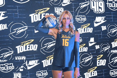 Woman In Toledo 16 Jersey Holding Volleyball GIF