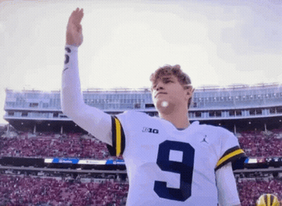 Woman In Toledo Jersey Holding Volleyball GIF