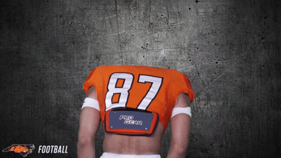 Woman In Toledo Volleyball Jersey By Sign GIF