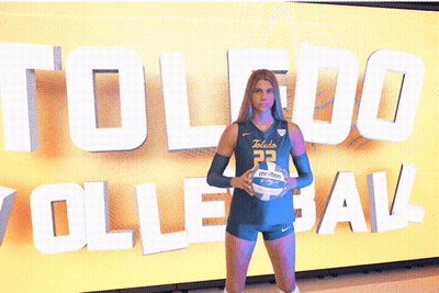 Woman In Toledo Volleyball Uniform Holding Volleyball GIF