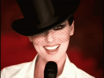 Woman In Top Hat And Veil Smiling GIF