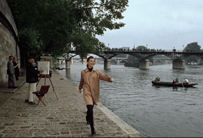 Woman In Trench Coat By River GIF