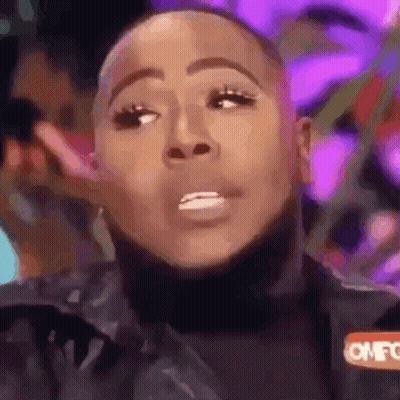 Woman In Turtleneck With Purple Background GIF