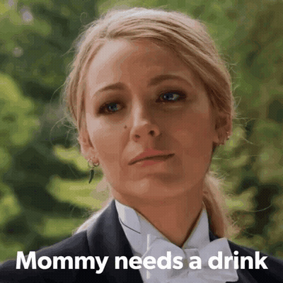 Woman In Tuxedo Mommy Needs A Drink GIF