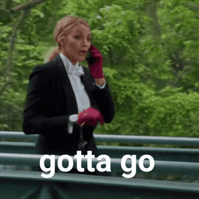 Woman In Tuxedo Talking On Cell Phone Saying Gotta Go GIF