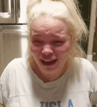 Woman In UCLA T-Shirt Crying GIF