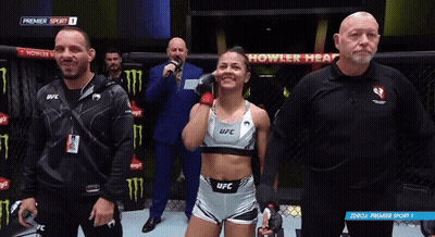Woman In UFC Outfit Standing In Ring GIF