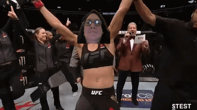 Woman In UFC Top Raising Hands GIF