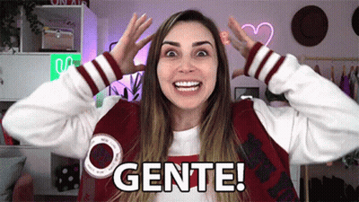 Woman In Varsity Jacket Making Funny Face Saying Gente GIF