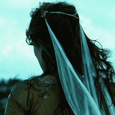Woman In Veil And Crown Looking Down GIF