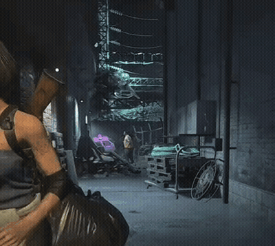 Woman In Video Game Holding Gun Over Shoulder GIF