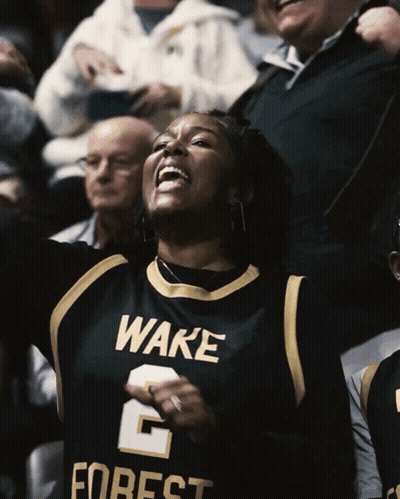 Woman In Wake Forest Jersey Cheering In Stands GIF