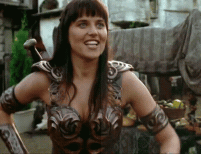 Woman In Warrior Costume Smiling GIF
